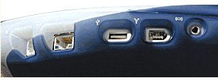 Shows the side of an iBook G3 DV.   From rear to front along the side is a modem port, ethernet port, USB port, Firewire port and headphone jack